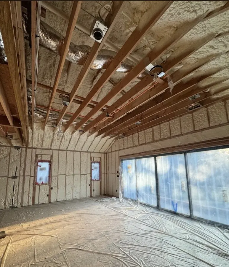 Interior walls and ceiling insulated with spray foam during new construction in Robinson